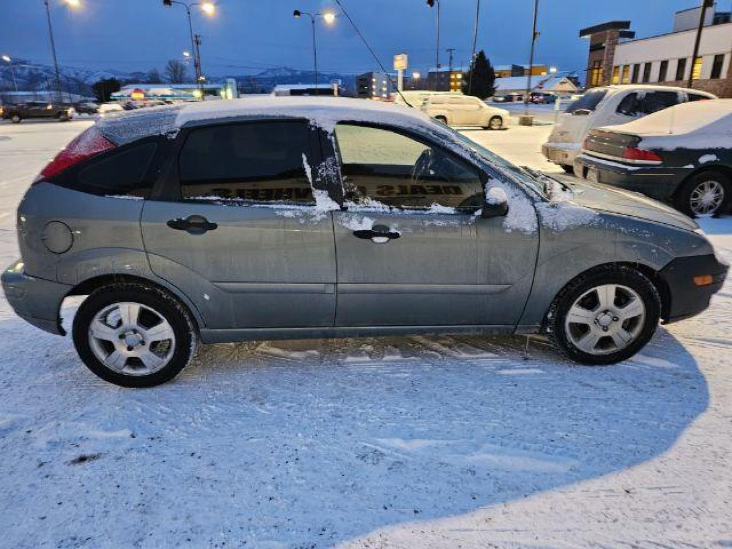 2005 Ford Focus ZX5 SES (3FAHP37N85R) with an 2.0L L4 DOHC 16V engine, located at 4047 Montana Ave., Billings, MT, 59101, 45.770847, -108.529800 - Photo#2
