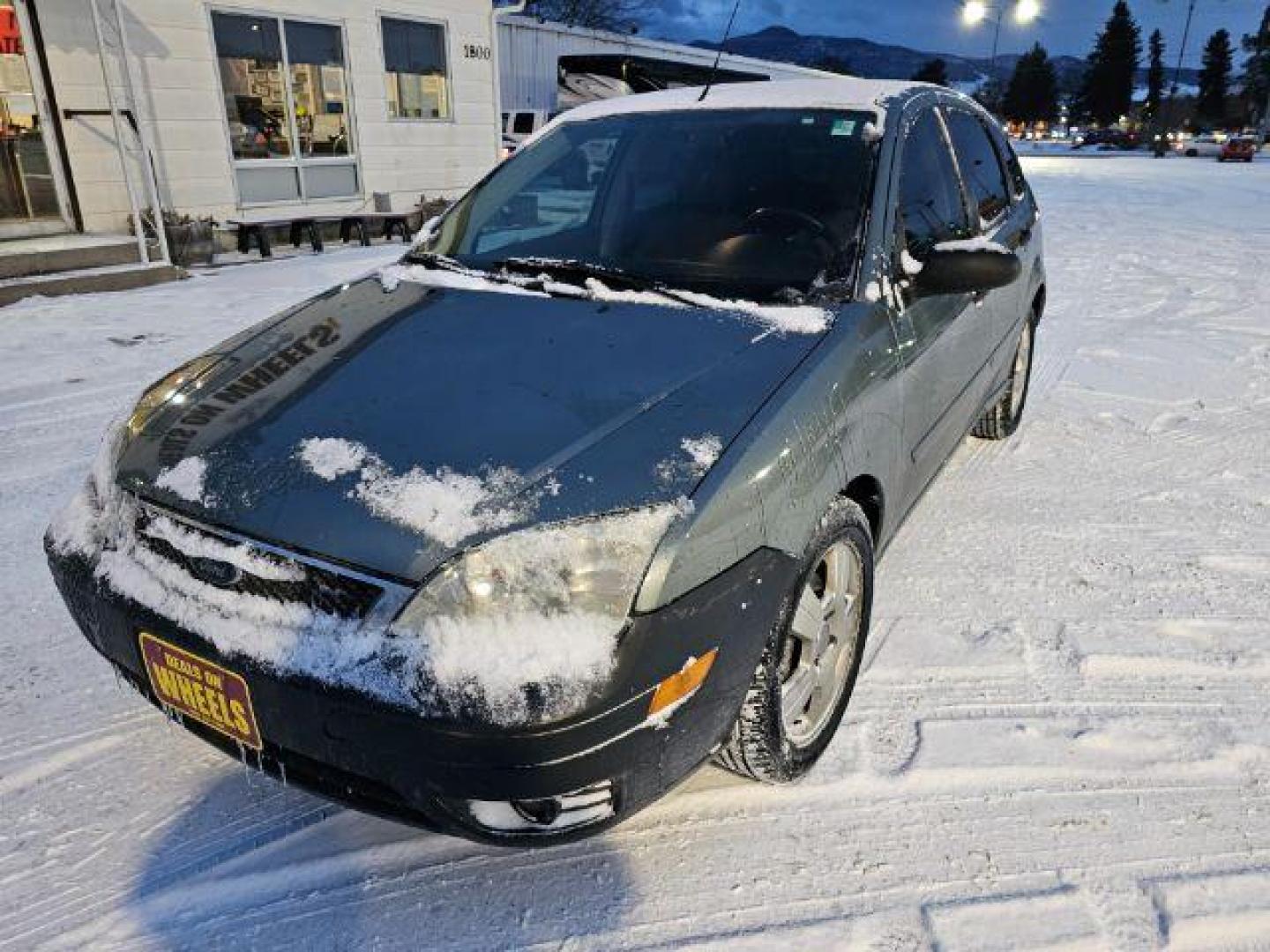 2005 Ford Focus ZX5 SES (3FAHP37N85R) with an 2.0L L4 DOHC 16V engine, located at 4047 Montana Ave., Billings, MT, 59101, 45.770847, -108.529800 - Photo#4