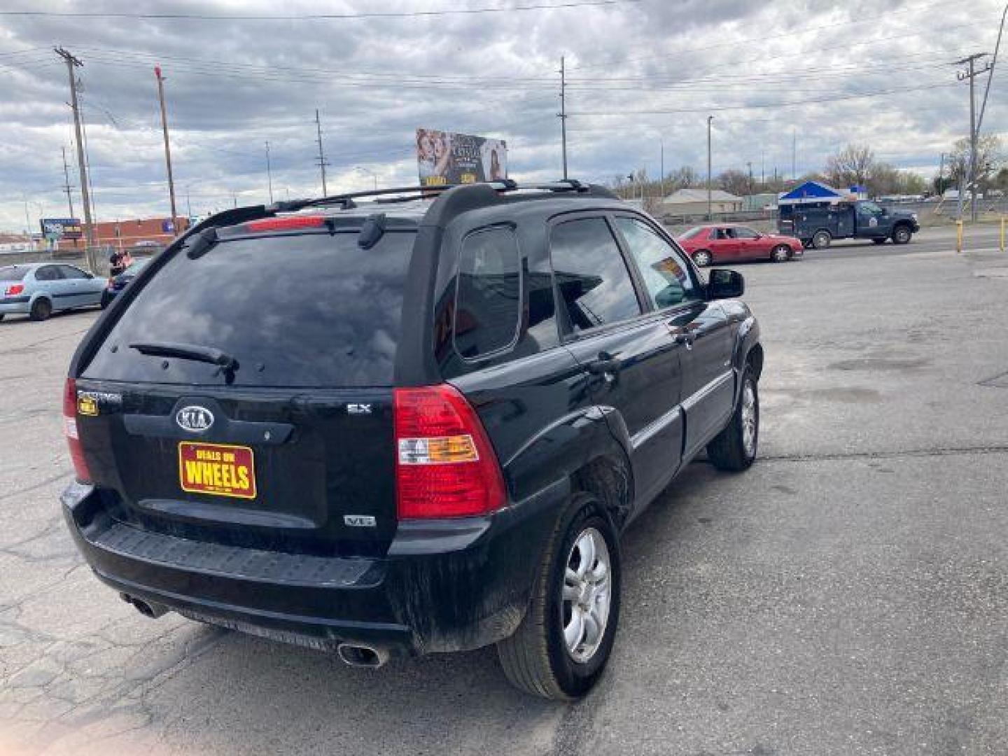 2005 Kia Sportage LX V6 4WD (KNDJE723657) with an 2.7L V6 DOHC 24V engine, 4-Speed Automatic transmission, located at 4047 Montana Ave., Billings, MT, 59101, 45.770847, -108.529800 - Photo#2