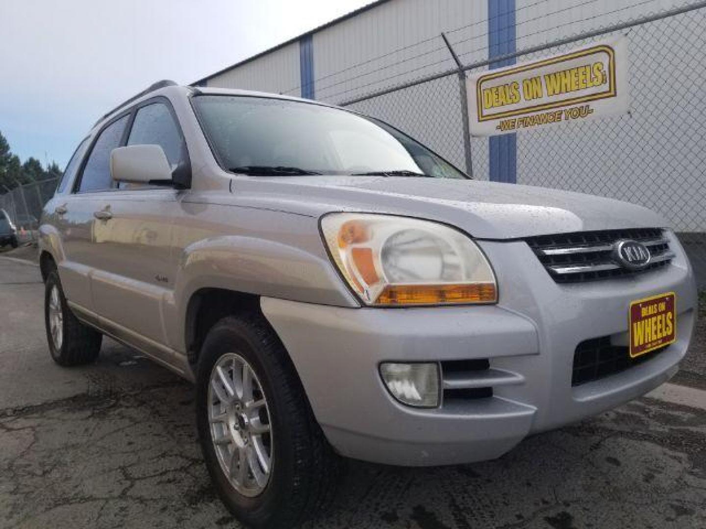 2005 Kia Sportage LX V6 4WD (KNDJE723257) with an 2.7L V6 DOHC 24V engine, 4-Speed Automatic transmission, located at 4047 Montana Ave., Billings, MT, 59101, 45.770847, -108.529800 - Photo#2