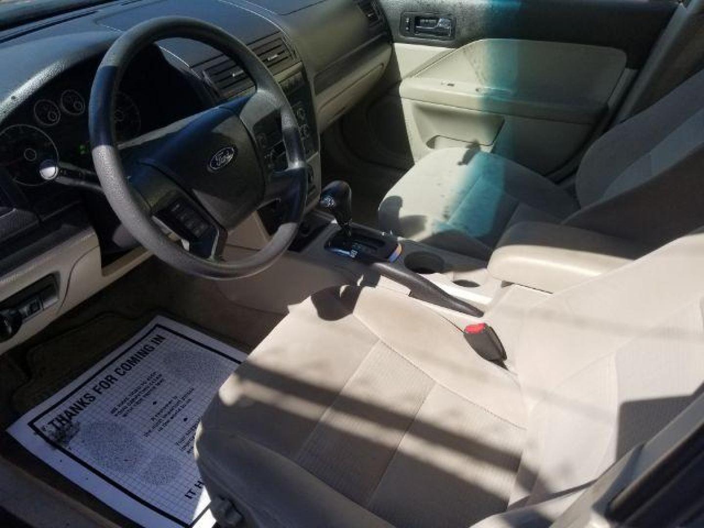 2006 Ford Fusion SE (3FAHP071X6R) with an Duratec 30 3L V-6 DOHC engine, located at 4047 Montana Ave., Billings, MT, 59101, 45.770847, -108.529800 - Photo#7