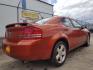 2008 Sunburst Orange Pear Dodge Avenger SXT (1B3LC56R08N) with an 2.7L V6 DOHC 24V FFV engine, 4-Speed Automatic transmission, located at 601 E. Idaho St., Kalispell, MT, 59901, 0.000000, 0.000000 - Photo#4
