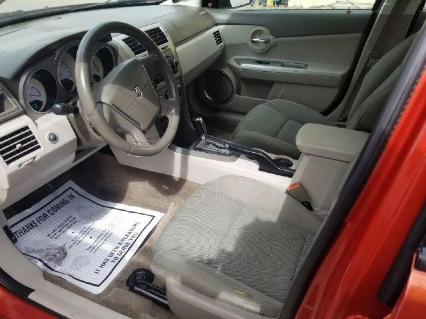 2008 Sunburst Orange Pear Dodge Avenger SXT (1B3LC56R08N) with an 2.7L V6 DOHC 24V FFV engine, 4-Speed Automatic transmission, located at 601 E. Idaho St., Kalispell, MT, 59901, 0.000000, 0.000000 - Photo#7