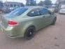 2008 GREEN FORD FOCUS green (1FAHP32N58W) with an 2.0L 16V engine, Manual transmission, located at 1821 N Montana Ave., Helena, MT, 59601, 0.000000, 0.000000 - Photo#1