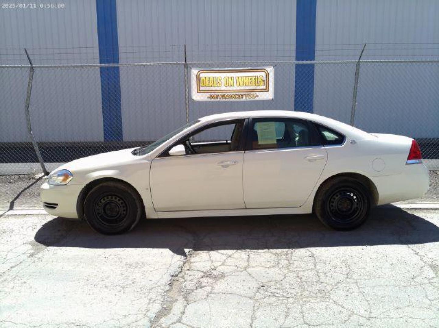 2009 White Chevrolet Impala LS (2G1WB57K091) with an 3.5L V6 OHV 16V FFV engine, 4-Speed Automatic transmission, located at 4801 10th Ave S,, Great Falls, MT, 59405, 0.000000, 0.000000 - Photo#1