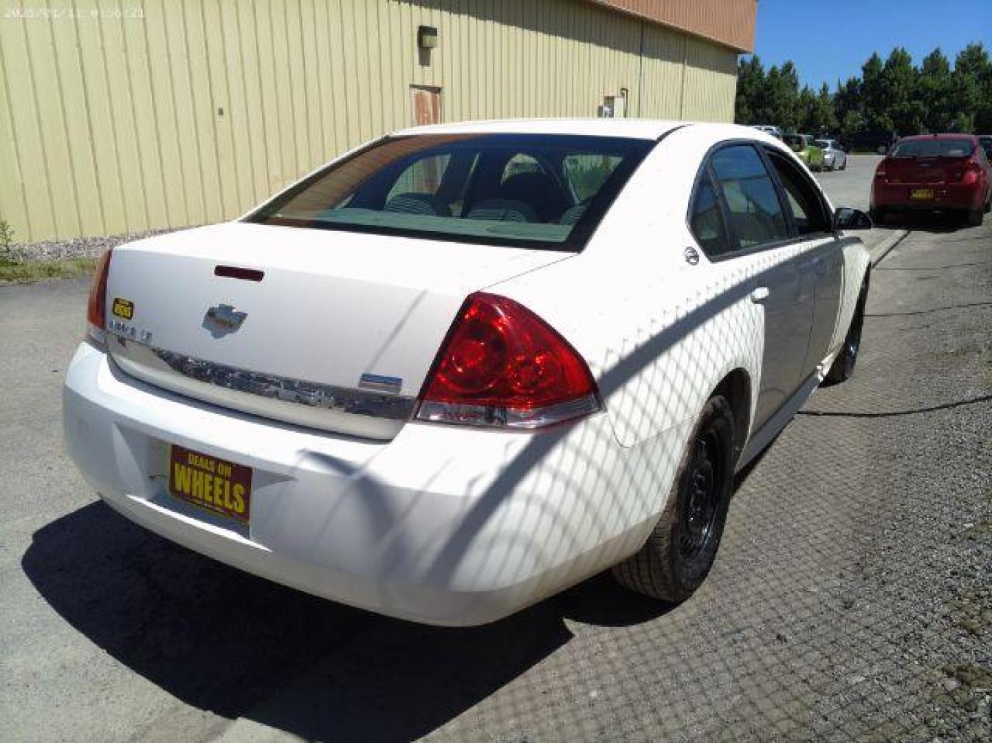 2009 White Chevrolet Impala LS (2G1WB57K091) with an 3.5L V6 OHV 16V FFV engine, 4-Speed Automatic transmission, located at 4801 10th Ave S,, Great Falls, MT, 59405, 0.000000, 0.000000 - Photo#3