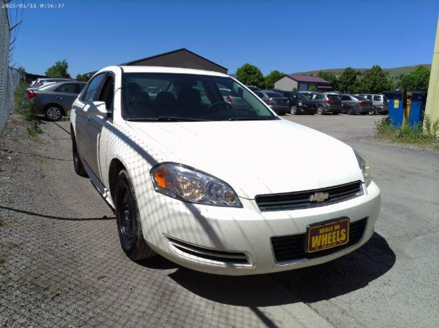 2009 White Chevrolet Impala LS (2G1WB57K091) with an 3.5L V6 OHV 16V FFV engine, 4-Speed Automatic transmission, located at 4801 10th Ave S,, Great Falls, MT, 59405, 0.000000, 0.000000 - Photo#4