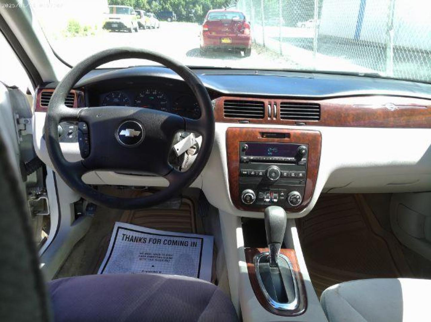 2009 White Chevrolet Impala LS (2G1WB57K091) with an 3.5L V6 OHV 16V FFV engine, 4-Speed Automatic transmission, located at 4801 10th Ave S,, Great Falls, MT, 59405, 0.000000, 0.000000 - Photo#7