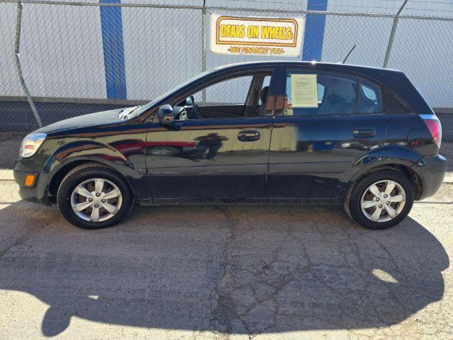 2009 Kia Rio5 LX (KNADE243296) with an 1.6L I-4 DOHC engine, located at 4801 10th Ave S,, Great Falls, MT, 59405, 0.000000, 0.000000 - Photo#0