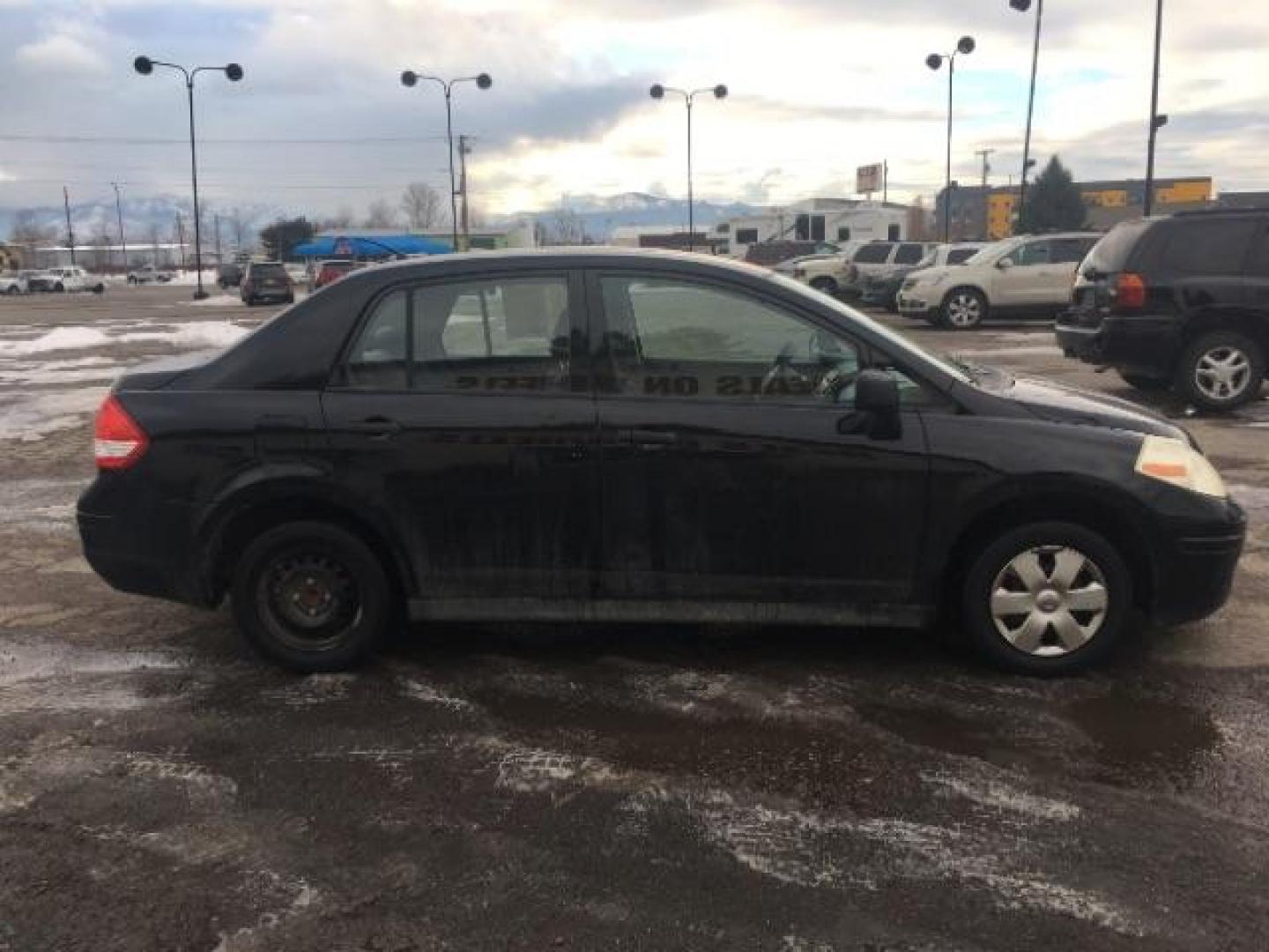 2009 Nissan Versa 1.6 Base Sedan (3N1CC11EX9L) with an 1.6L L4 DOHC 16V engine, Automatic transmission, located at 1800 West Broadway, Missoula, 59808, (406) 543-1986, 46.881348, -114.023628 - Photo#2