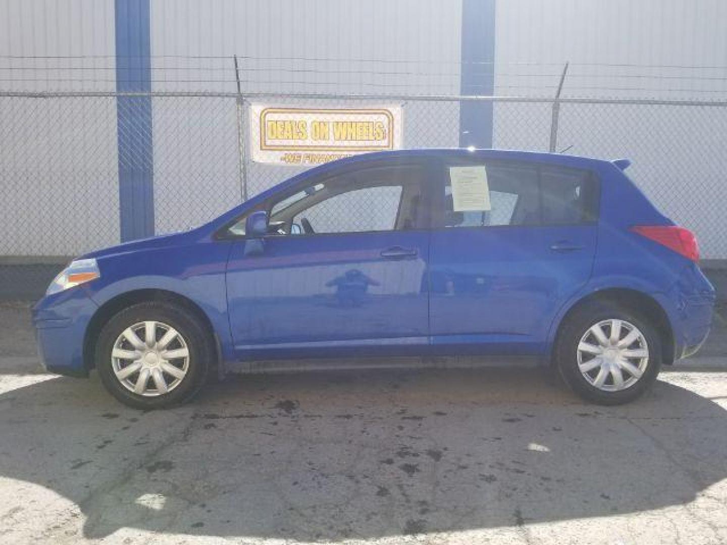 2009 Nissan Versa 1.8S (3N1BC13E19L) with an 1.8L I-4 DOHC engine, located at 1800 West Broadway, Missoula, 59808, (406) 543-1986, 46.881348, -114.023628 - Photo#6