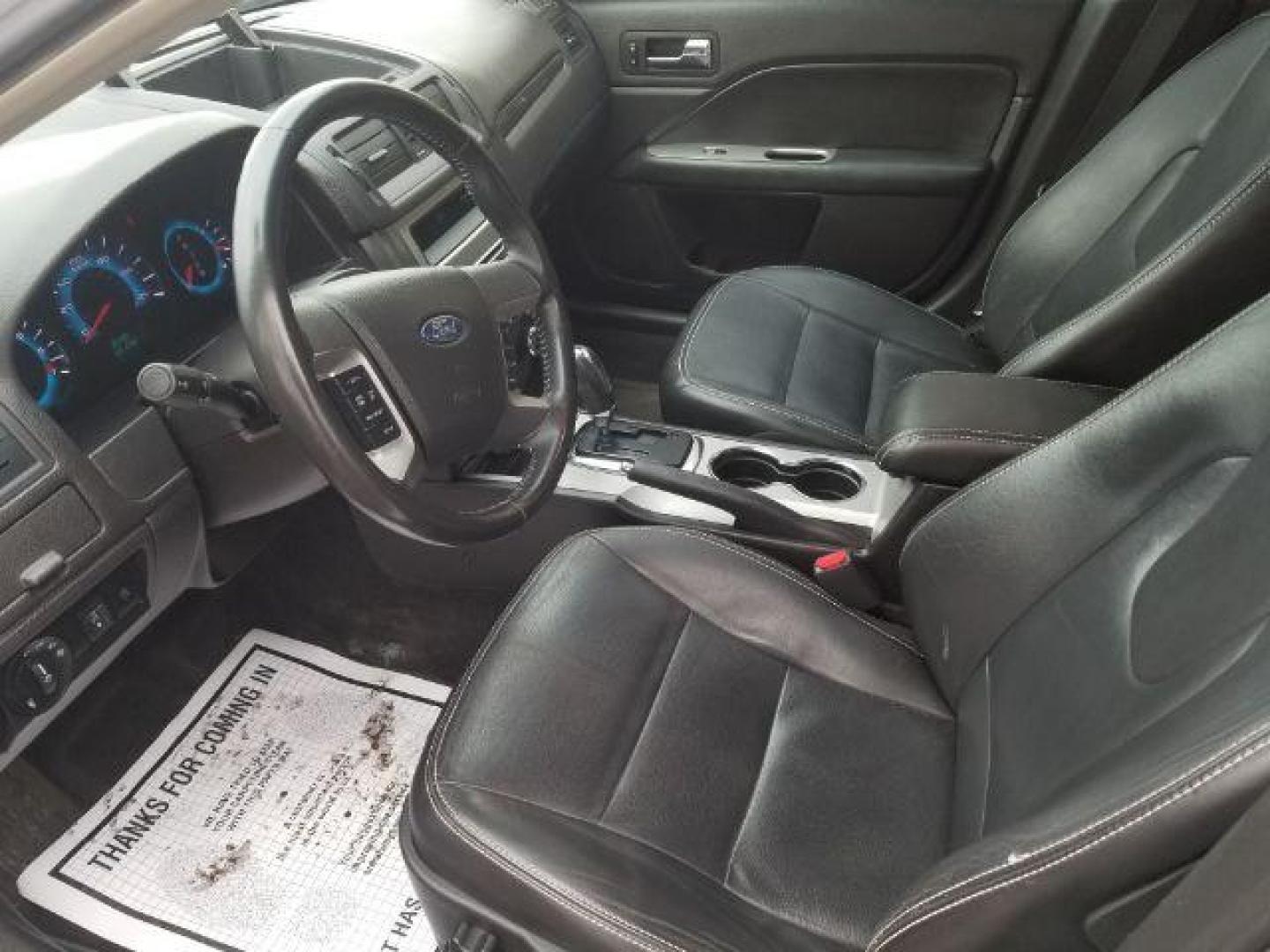 2010 Ford Fusion SEL (3FAHP0JG7AR) with an 2.5L I-4 DOHC engine, located at 4047 Montana Ave., Billings, MT, 59101, 45.770847, -108.529800 - Photo#7