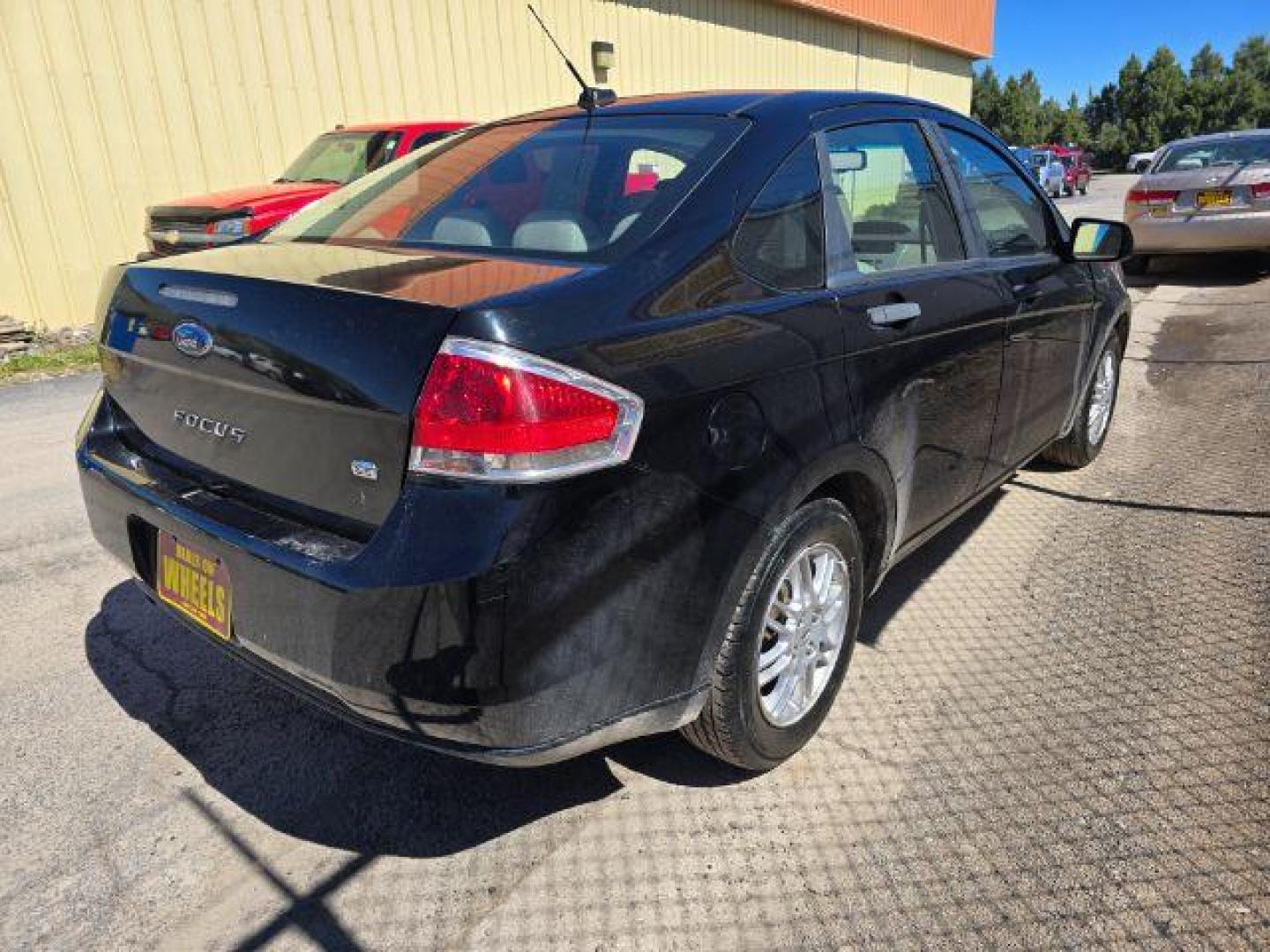 2011 Ford Focus SE Sedan (1FAHP3FN6BW) with an 2.0L L4 DOHC 16V engine, located at 4047 Montana Ave., Billings, MT, 59101, 45.770847, -108.529800 - Photo#3