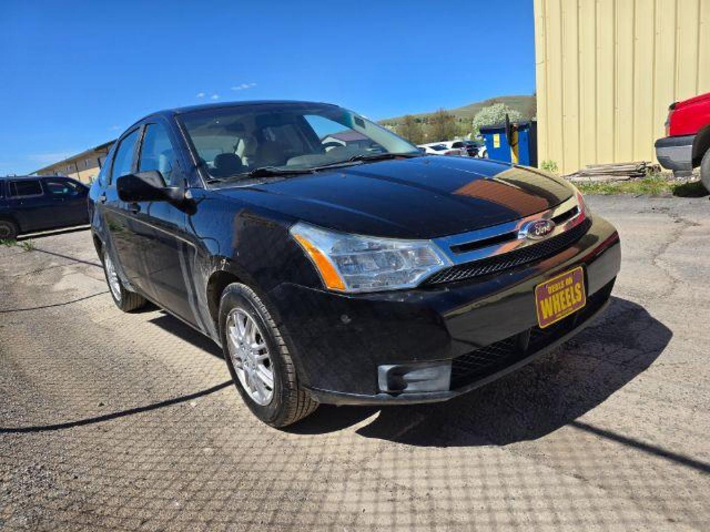2011 Ford Focus SE Sedan (1FAHP3FN6BW) with an 2.0L L4 DOHC 16V engine, located at 4047 Montana Ave., Billings, MT, 59101, 45.770847, -108.529800 - Photo#4