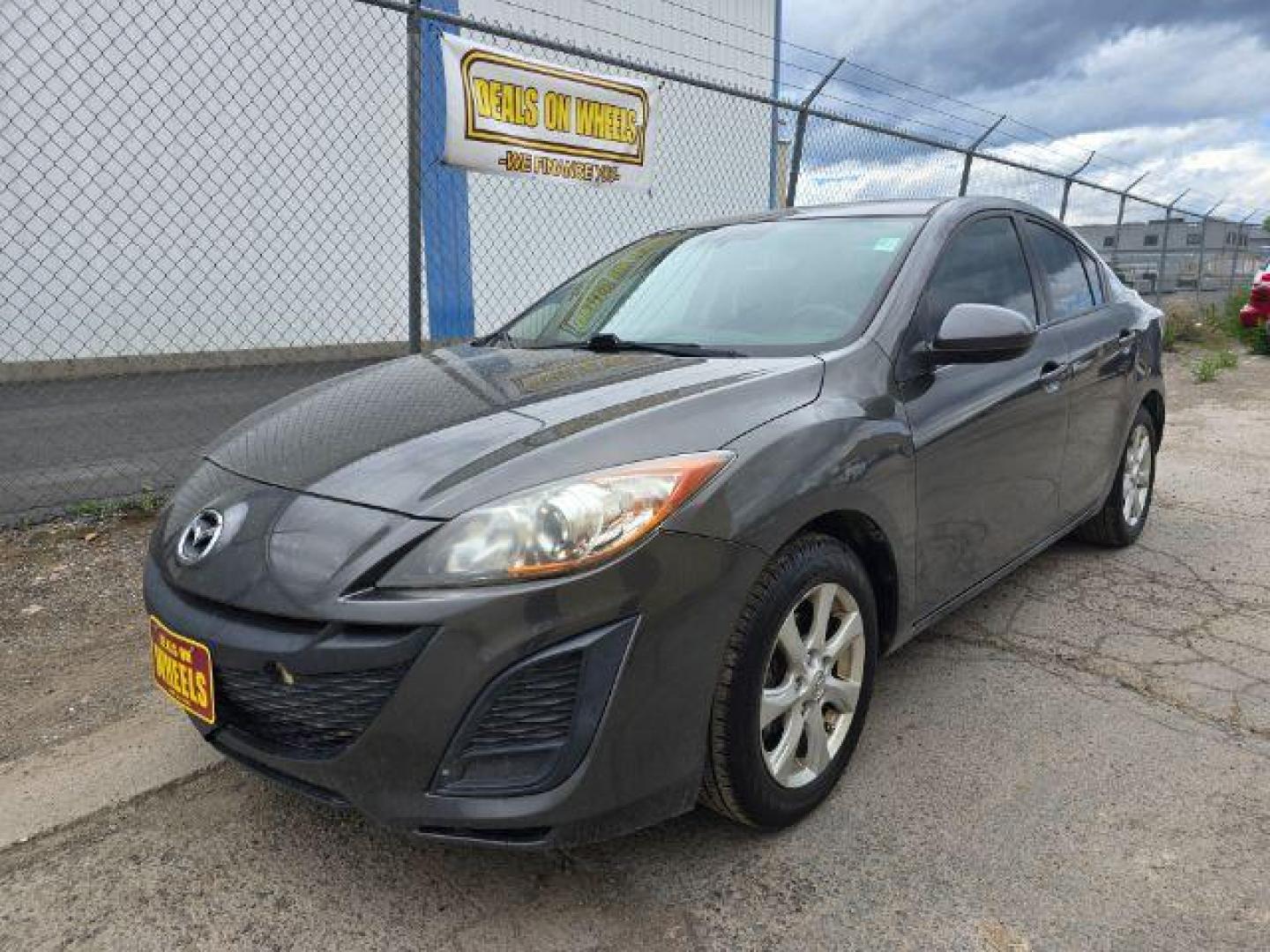 2011 Mazda MAZDA3 i Touring 4-Door (JM1BL1VF2B1) with an 2.0L L4 DOHC 16V engine, 5-Speed Manual transmission, located at 4047 Montana Ave., Billings, MT, 59101, 45.770847, -108.529800 - Photo#0