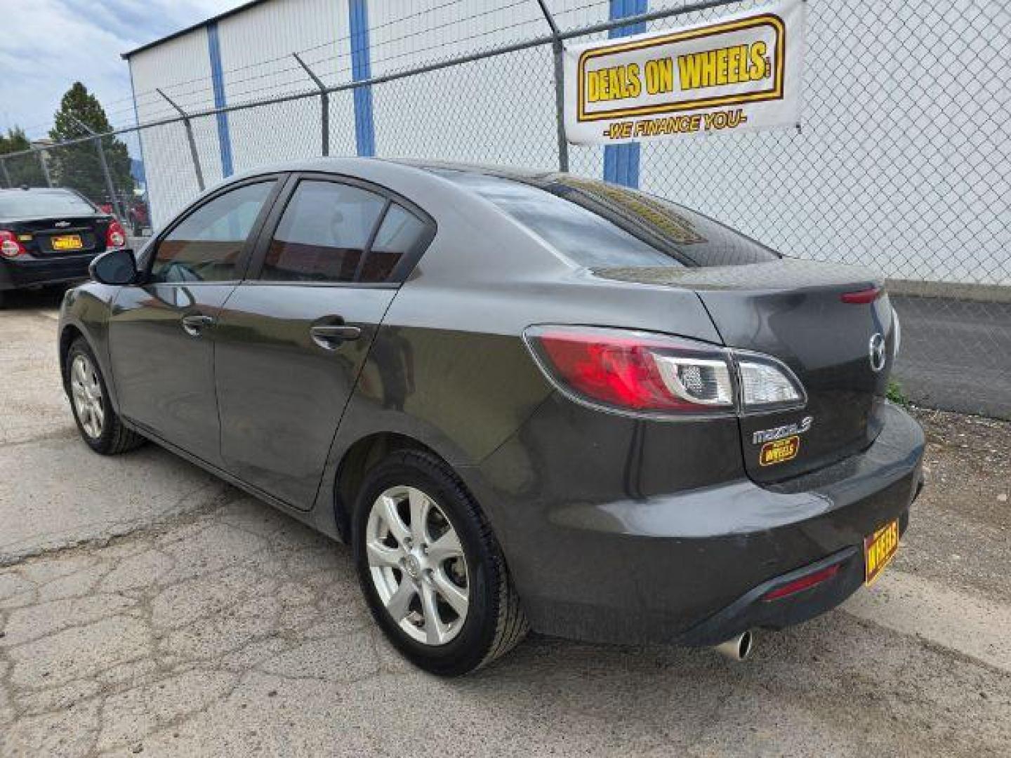 2011 Mazda MAZDA3 i Touring 4-Door (JM1BL1VF2B1) with an 2.0L L4 DOHC 16V engine, 5-Speed Manual transmission, located at 4047 Montana Ave., Billings, MT, 59101, 45.770847, -108.529800 - Photo#2