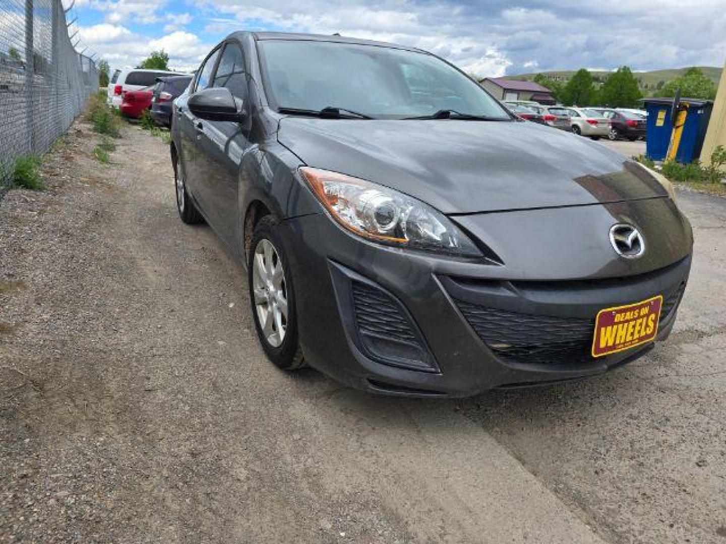2011 Mazda MAZDA3 i Touring 4-Door (JM1BL1VF2B1) with an 2.0L L4 DOHC 16V engine, 5-Speed Manual transmission, located at 4047 Montana Ave., Billings, MT, 59101, 45.770847, -108.529800 - Photo#4