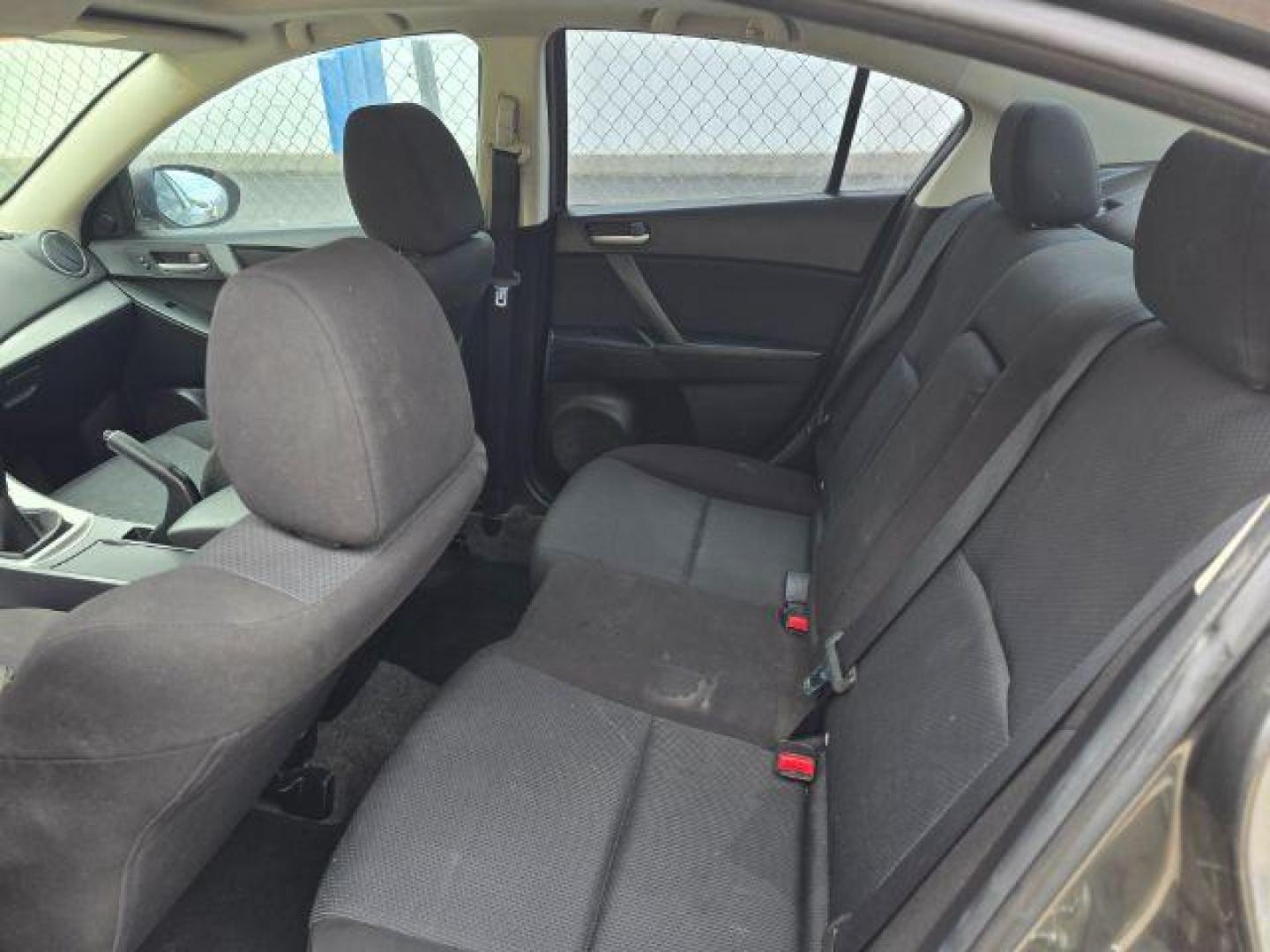 2011 Mazda MAZDA3 i Touring 4-Door (JM1BL1VF2B1) with an 2.0L L4 DOHC 16V engine, 5-Speed Manual transmission, located at 4047 Montana Ave., Billings, MT, 59101, 45.770847, -108.529800 - Photo#6