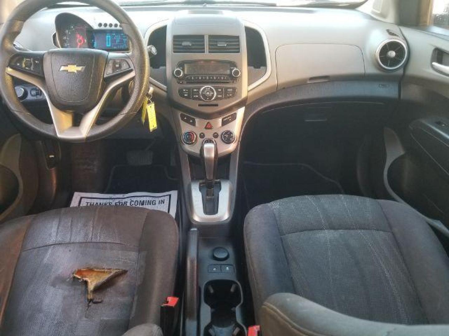 2012 Victory Red Chevrolet Sonic 2LT Sedan (1G1JC5SH9C4) with an 1.8L L4 DOHC 24V engine, 6-Speed Automatic transmission, located at 1821 N Montana Ave., Helena, MT, 59601, 0.000000, 0.000000 - Photo#10