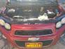 2012 Victory Red Chevrolet Sonic 2LT Sedan (1G1JC5SH9C4) with an 1.8L L4 DOHC 24V engine, 6-Speed Automatic transmission, located at 1821 N Montana Ave., Helena, MT, 59601, 0.000000, 0.000000 - Photo#13