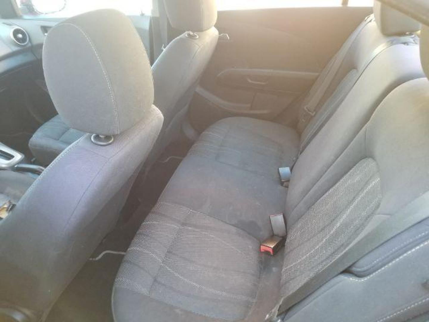 2012 Victory Red Chevrolet Sonic 2LT Sedan (1G1JC5SH9C4) with an 1.8L L4 DOHC 24V engine, 6-Speed Automatic transmission, located at 1821 N Montana Ave., Helena, MT, 59601, 0.000000, 0.000000 - Photo#8