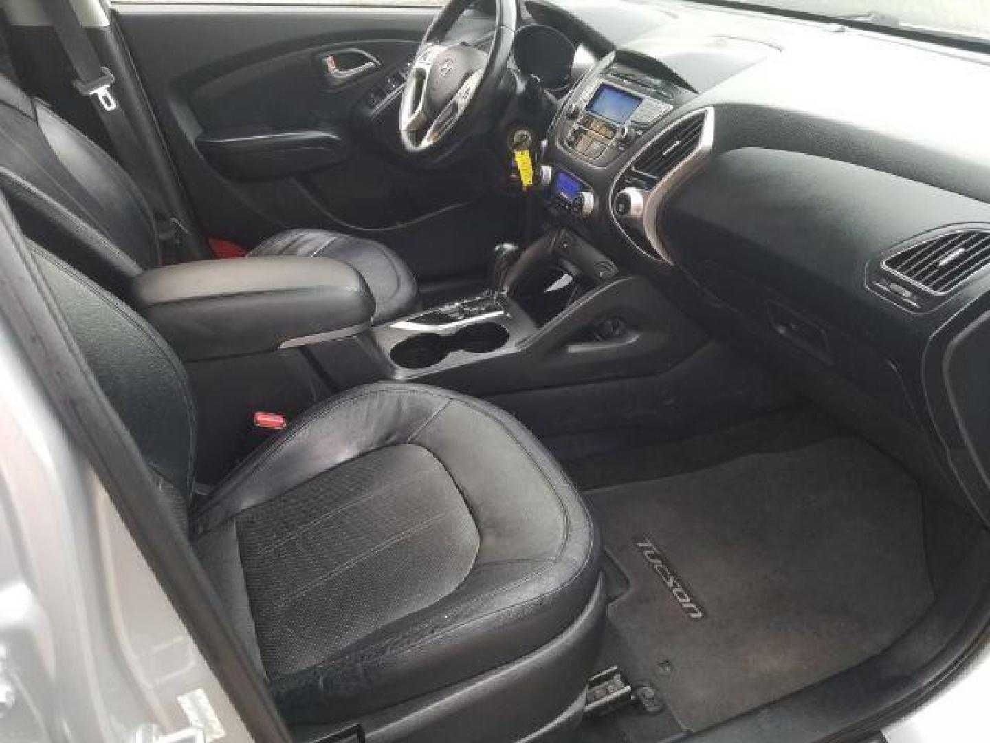 2012 Hyundai Tucson Limited (KM8JUCAC8CU) with an Theta II 2.4L I-4 DOHC engine, located at 1800 West Broadway, Missoula, 59808, (406) 543-1986, 46.881348, -114.023628 - Photo#9