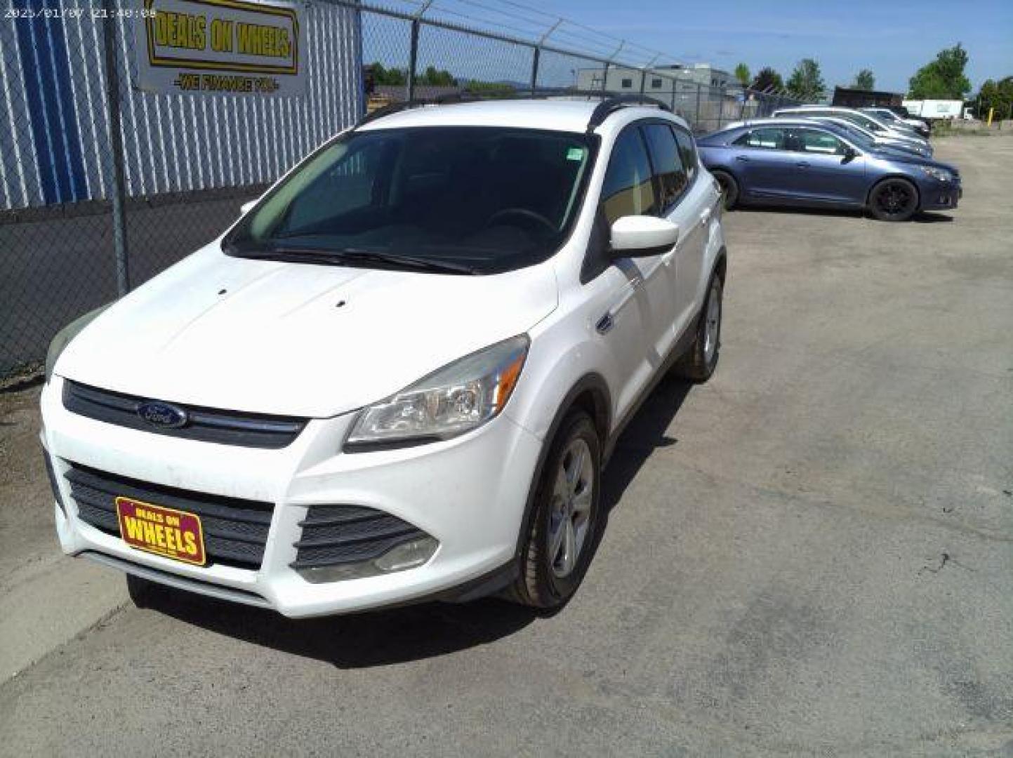 2013 Ford Escape SE 4WD (1FMCU9GX5DU) with an 1.6L L4 DOHC 16V engine, 6-Speed Automatic transmission, located at 4801 10th Ave S,, Great Falls, MT, 59405, 0.000000, 0.000000 - Photo#0