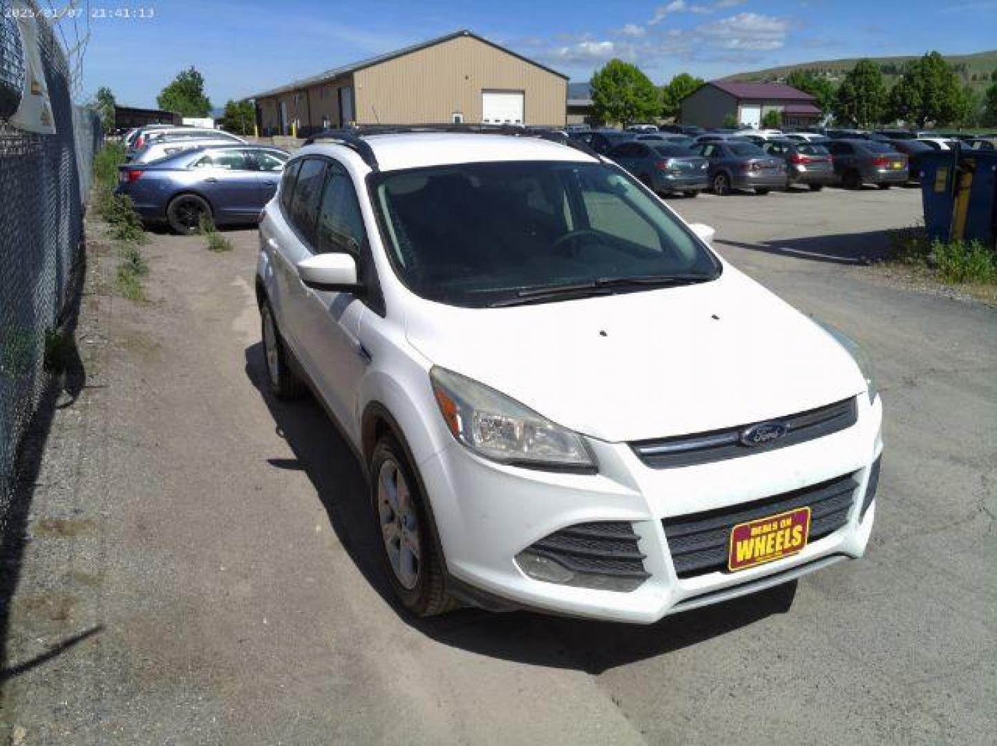 2013 Ford Escape SE 4WD (1FMCU9GX5DU) with an 1.6L L4 DOHC 16V engine, 6-Speed Automatic transmission, located at 4801 10th Ave S,, Great Falls, MT, 59405, 0.000000, 0.000000 - Photo#4