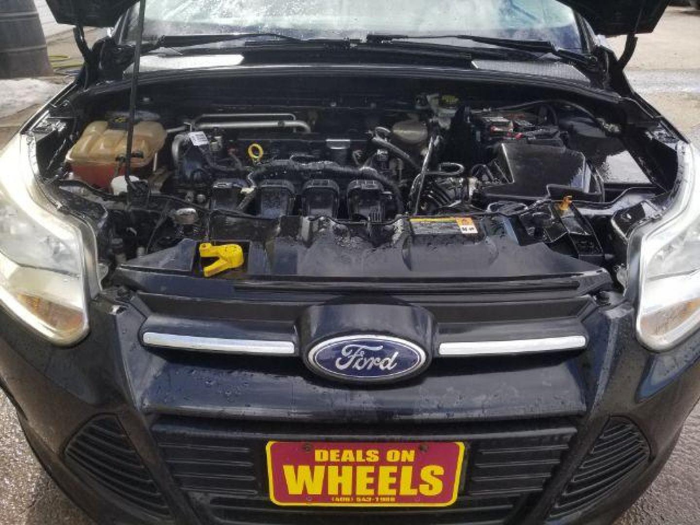 2014 Ford Focus S (1FADP3E20EL) with an 2L I-4 gasoline direct injection engine, located at 4801 10th Ave S,, Great Falls, MT, 59405, 0.000000, 0.000000 - Photo#13