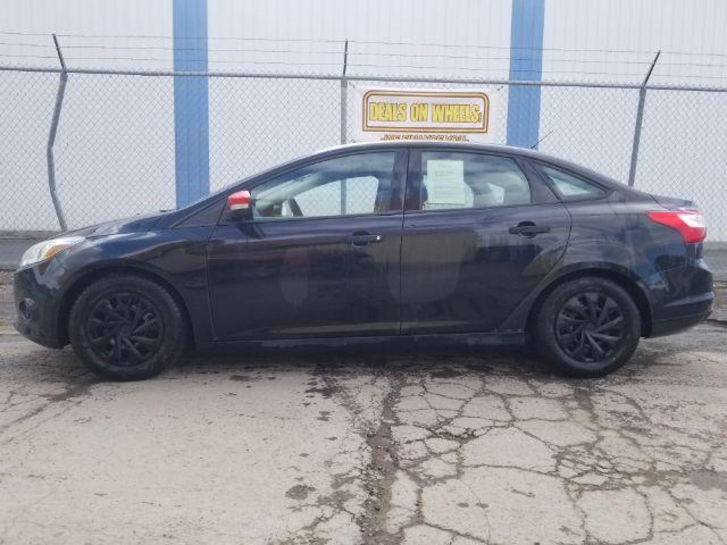 2014 Ford Focus S (1FADP3E20EL) with an 2L I-4 gasoline direct injection engine, located at 4801 10th Ave S,, Great Falls, MT, 59405, 0.000000, 0.000000 - Photo#6