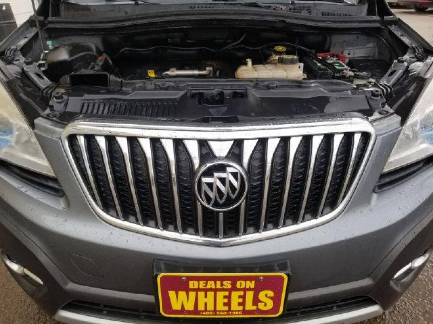 2015 Buick Encore Convenience (KL4CJFSB4FB) with an Ecotec 1.4L I-4 DOHC engine, located at 601 E. Idaho St., Kalispell, MT, 59901, 0.000000, 0.000000 - Photo#13