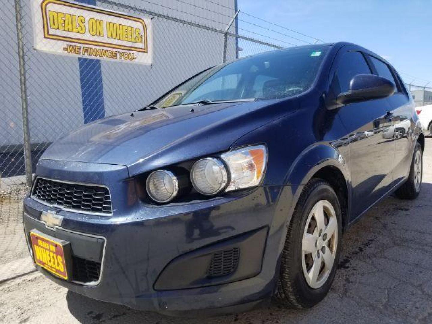 2015 Chevrolet Sonic LS Manual (1G1JB6SH1F4) with an ECOTEC 1.8L I-4 DOHC engine, located at 4801 10th Ave S,, Great Falls, MT, 59405, 0.000000, 0.000000 - Photo#0
