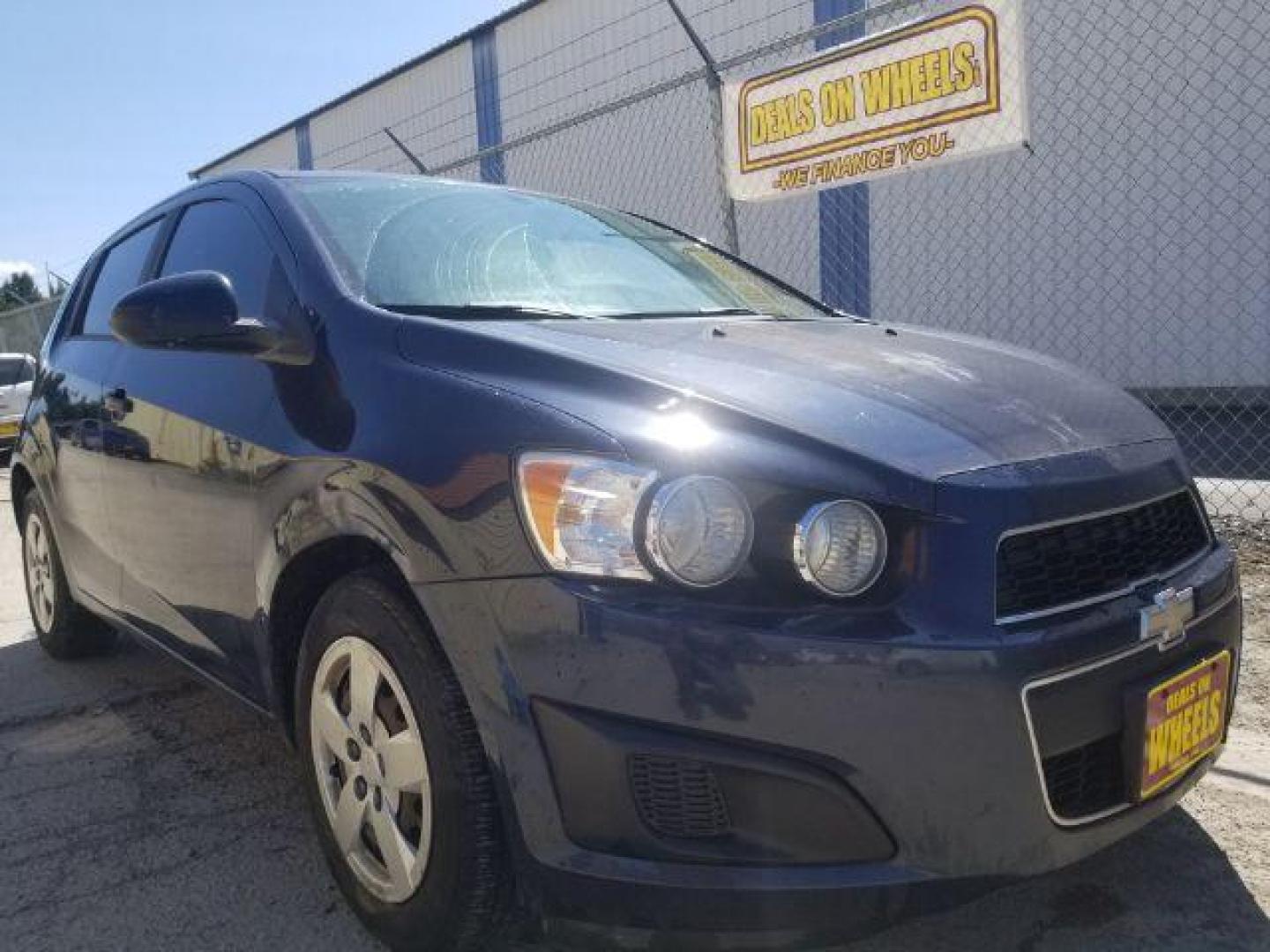 2015 Chevrolet Sonic LS Manual (1G1JB6SH1F4) with an ECOTEC 1.8L I-4 DOHC engine, located at 4801 10th Ave S,, Great Falls, MT, 59405, 0.000000, 0.000000 - Photo#2