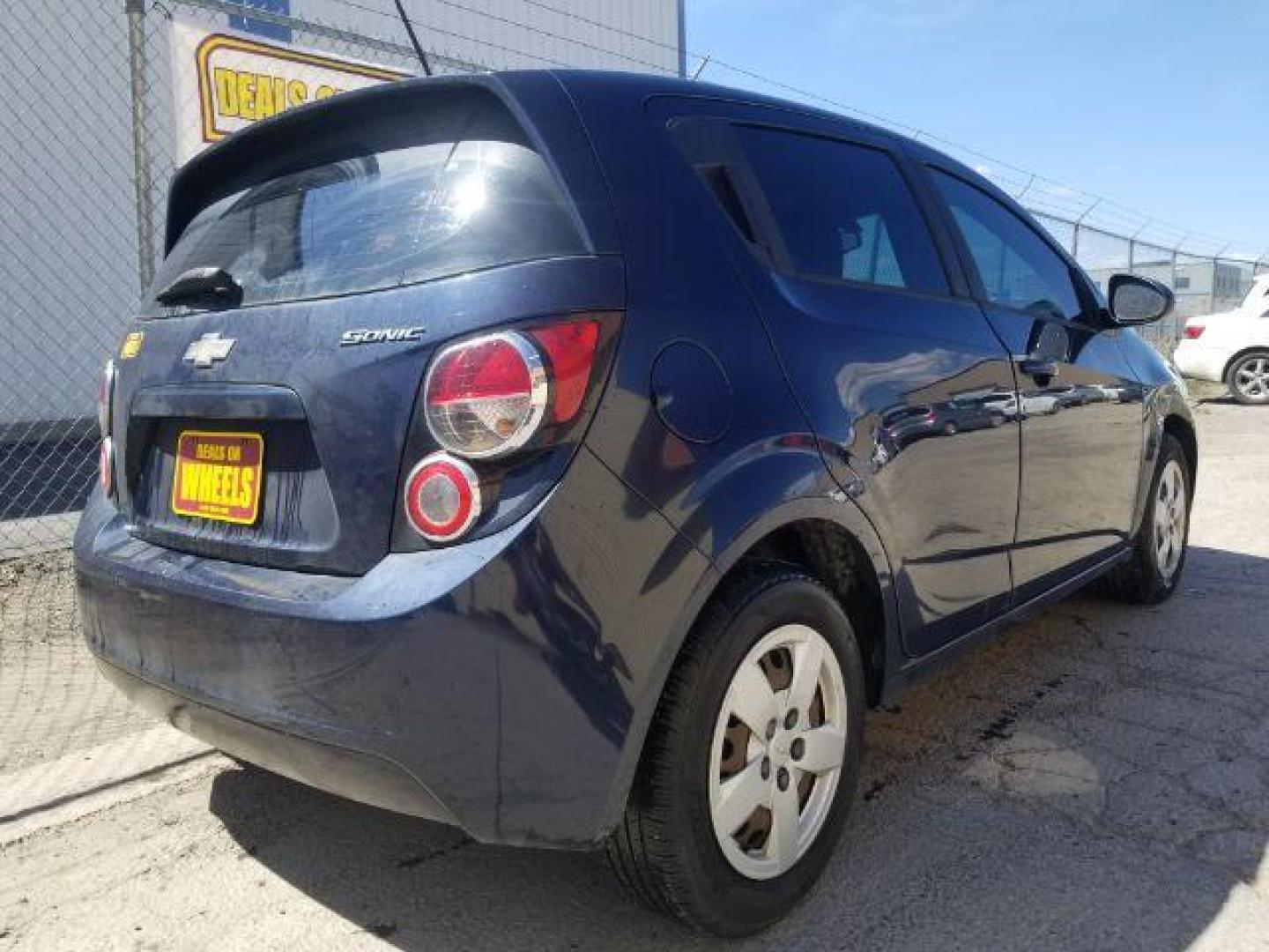 2015 Chevrolet Sonic LS Manual (1G1JB6SH1F4) with an ECOTEC 1.8L I-4 DOHC engine, located at 4801 10th Ave S,, Great Falls, MT, 59405, 0.000000, 0.000000 - Photo#4