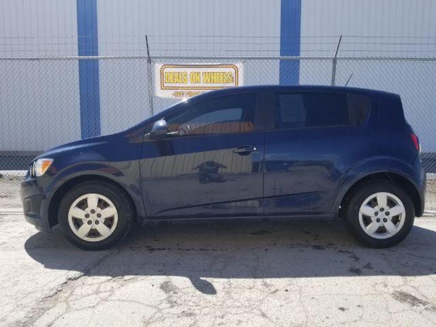 2015 Chevrolet Sonic LS Manual (1G1JB6SH1F4) with an ECOTEC 1.8L I-4 DOHC engine, located at 4801 10th Ave S,, Great Falls, MT, 59405, 0.000000, 0.000000 - Photo#6