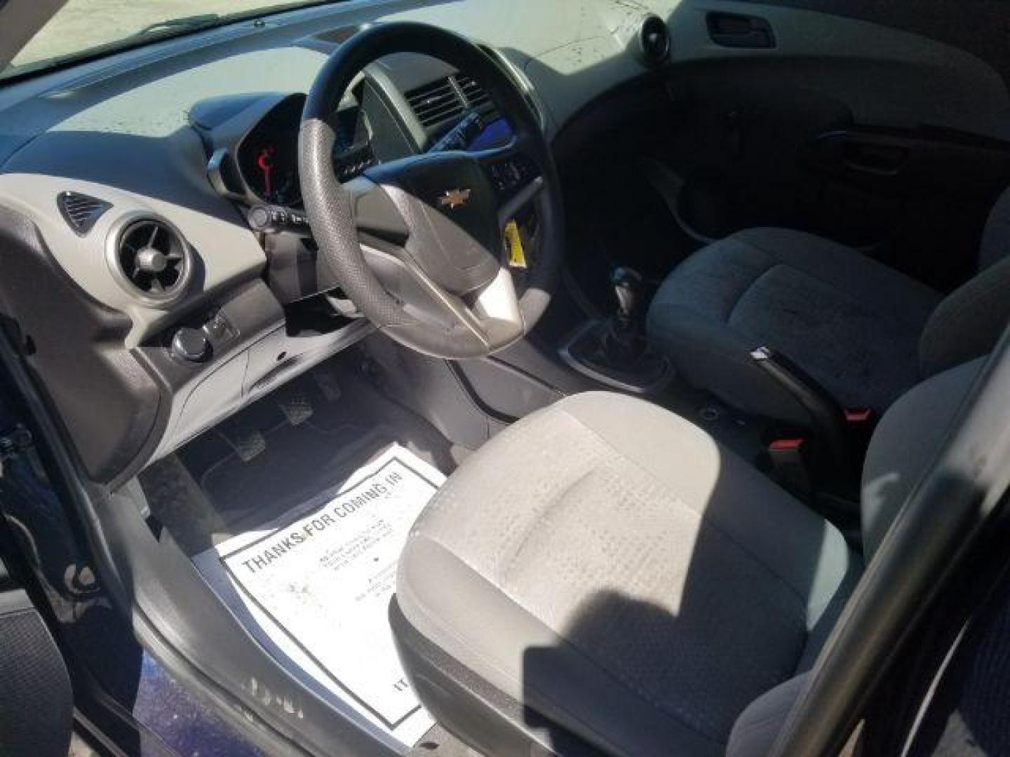 2015 Chevrolet Sonic LS Manual (1G1JB6SH1F4) with an ECOTEC 1.8L I-4 DOHC engine, located at 4801 10th Ave S,, Great Falls, MT, 59405, 0.000000, 0.000000 - Photo#7