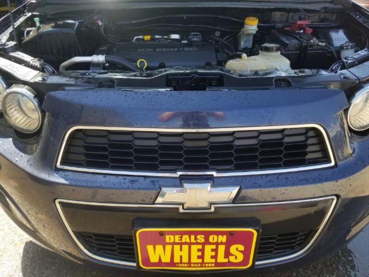 2015 Chevrolet Sonic LS Manual (1G1JB6SH1F4) with an ECOTEC 1.8L I-4 DOHC engine, located at 4801 10th Ave S,, Great Falls, MT, 59405, 0.000000, 0.000000 - Photo#13