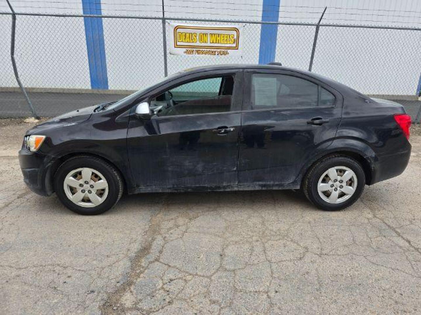 2016 Chevrolet Sonic LS Auto Sedan (1G1JA5SH2G4) with an 1.8L L4 DOHC 24V engine, 6-Speed Automatic transmission, located at 1800 West Broadway, Missoula, 59808, (406) 543-1986, 46.881348, -114.023628 - Photo#1