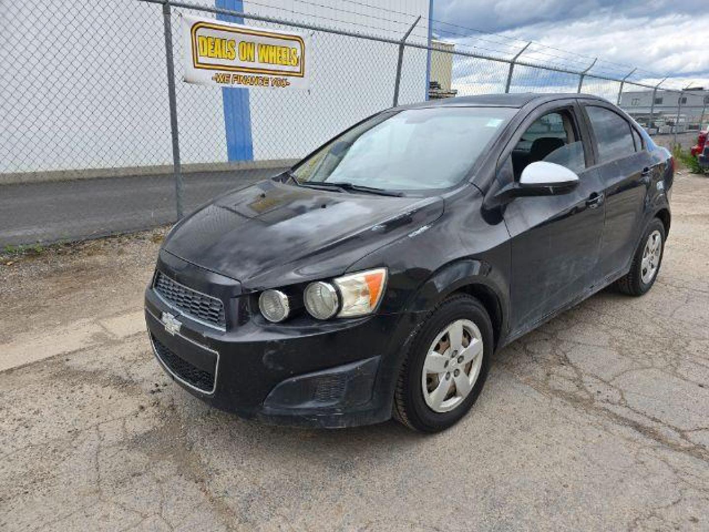 2016 Chevrolet Sonic LS Auto Sedan (1G1JA5SH2G4) with an 1.8L L4 DOHC 24V engine, 6-Speed Automatic transmission, located at 1800 West Broadway, Missoula, 59808, (406) 543-1986, 46.881348, -114.023628 - Photo#0