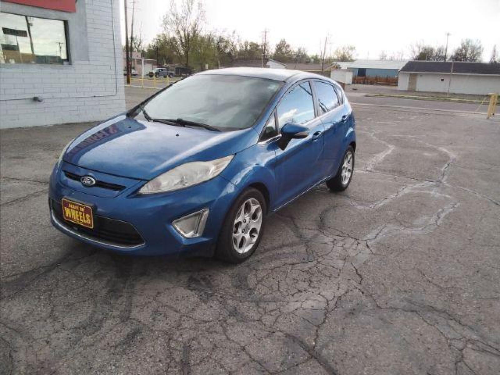 2011 Ford Fiesta SES Hatchback (3FADP4FJ6BM) with an 1.6L L4 DOHC 16V engine, located at 4047 Montana Ave, Billings, MT, 59101, (406) 543-1986, 45.770824, -108.529411 - Photo #0