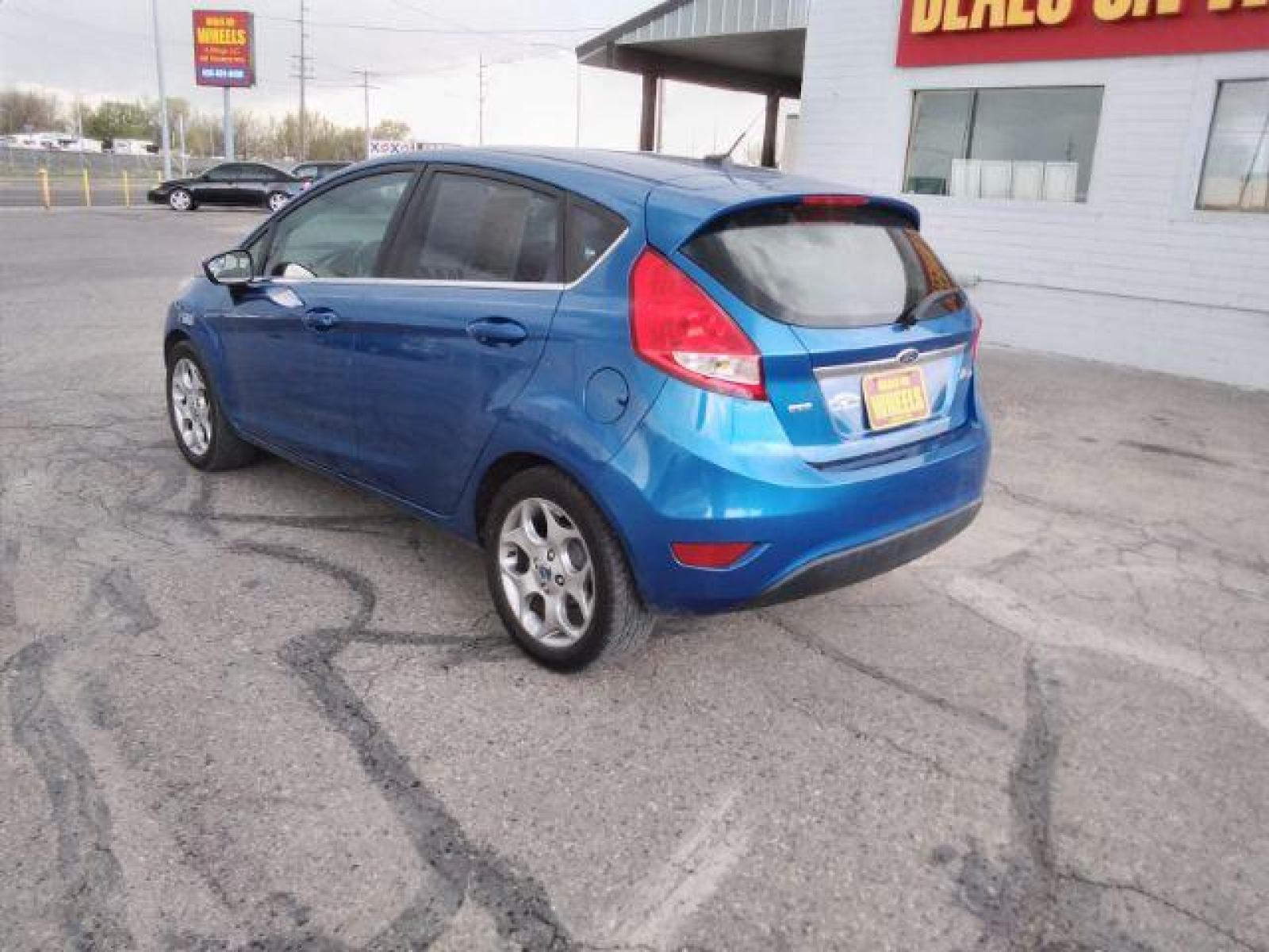 2011 Ford Fiesta SES Hatchback (3FADP4FJ6BM) with an 1.6L L4 DOHC 16V engine, located at 4047 Montana Ave, Billings, MT, 59101, (406) 543-1986, 45.770824, -108.529411 - Photo #2