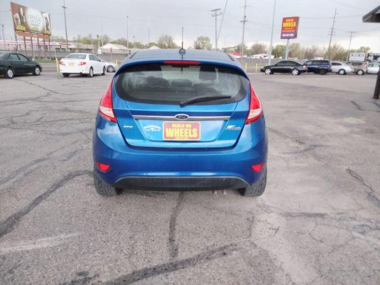 2011 Ford Fiesta SES Hatchback (3FADP4FJ6BM) with an 1.6L L4 DOHC 16V engine, located at 4047 Montana Ave, Billings, MT, 59101, (406) 543-1986, 45.770824, -108.529411 - Photo #3
