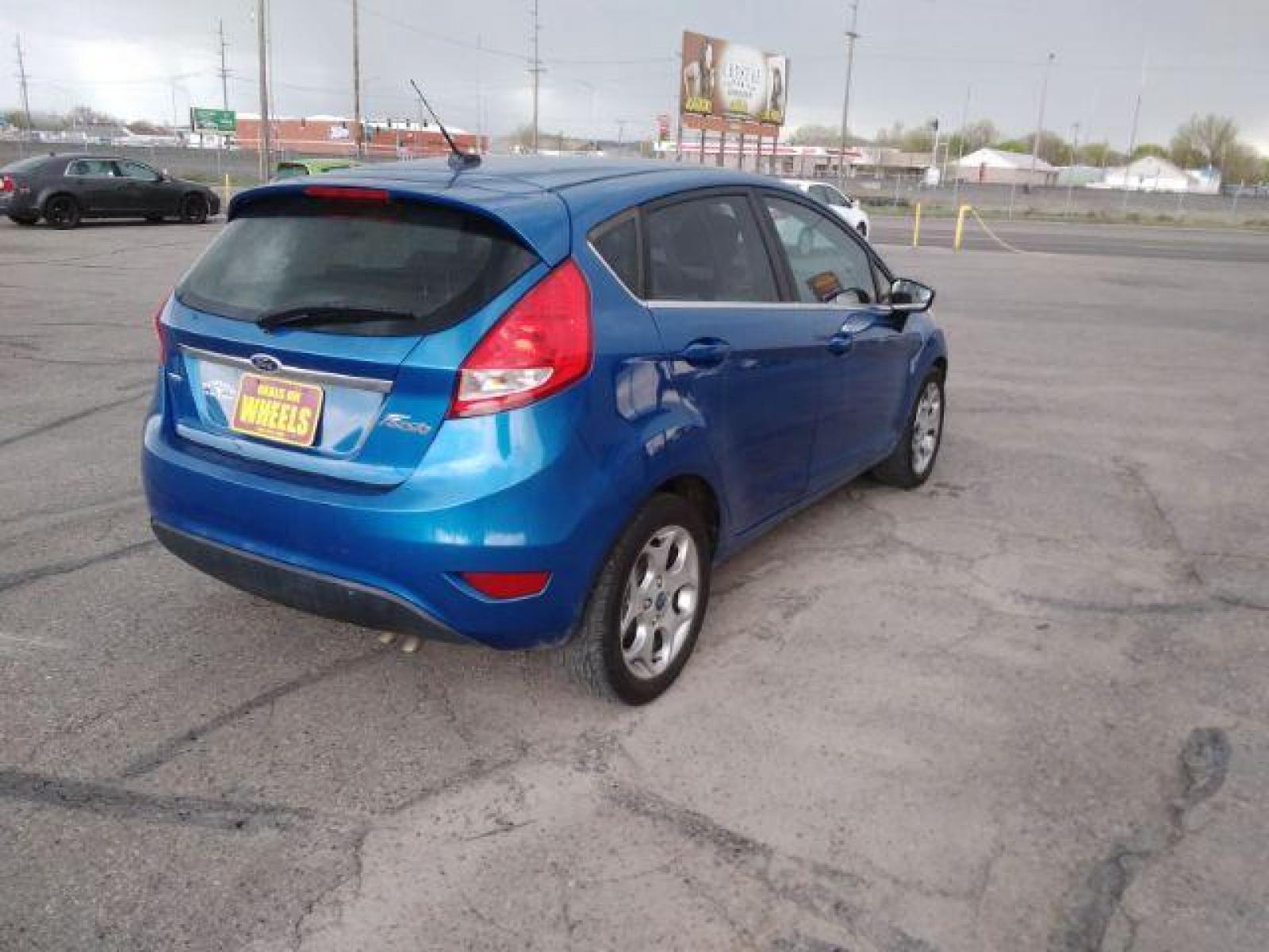 2011 Ford Fiesta SES Hatchback (3FADP4FJ6BM) with an 1.6L L4 DOHC 16V engine, located at 4047 Montana Ave, Billings, MT, 59101, (406) 543-1986, 45.770824, -108.529411 - Photo #4