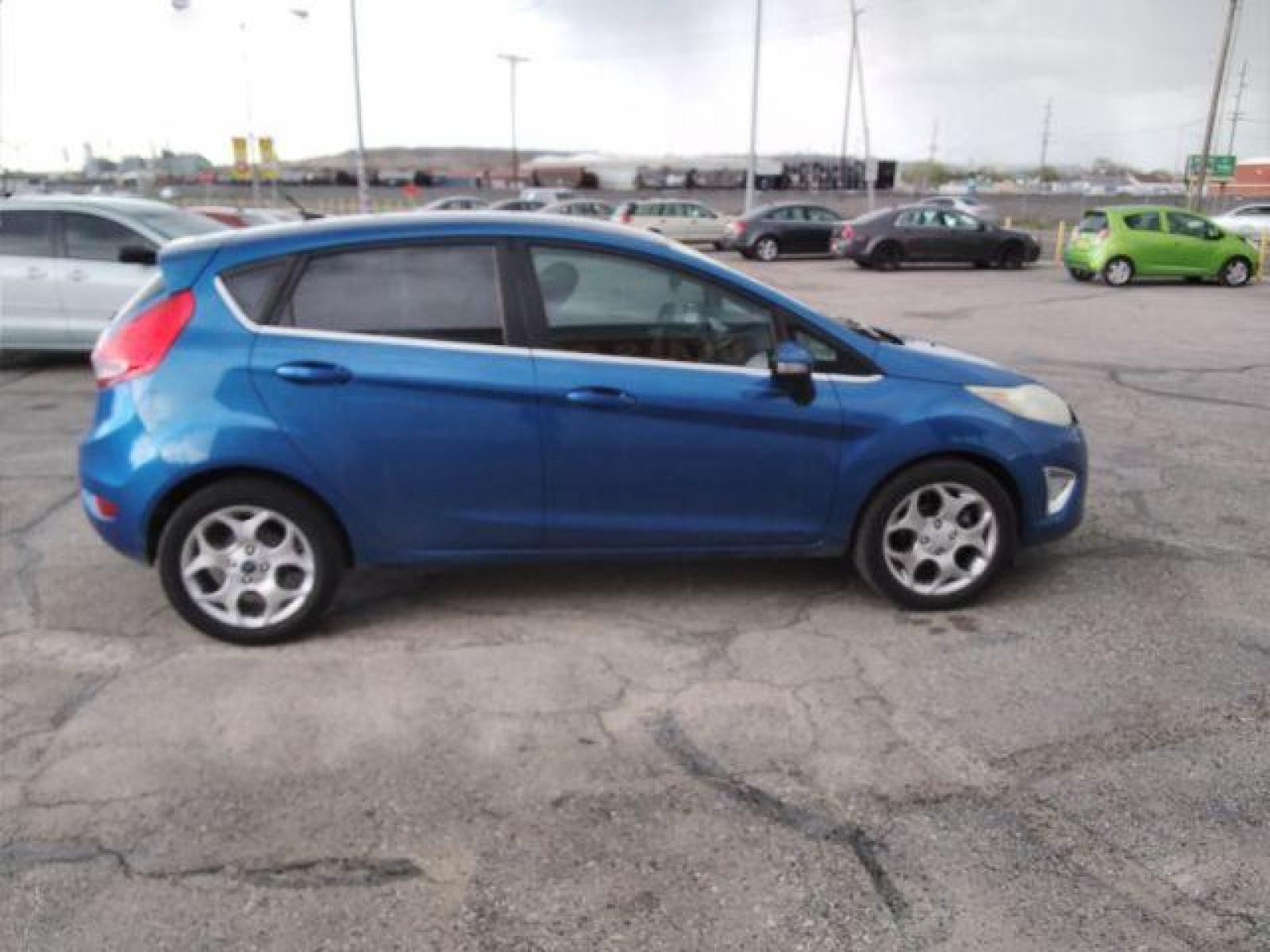 2011 Ford Fiesta SES Hatchback (3FADP4FJ6BM) with an 1.6L L4 DOHC 16V engine, located at 4047 Montana Ave, Billings, MT, 59101, (406) 543-1986, 45.770824, -108.529411 - Photo #5