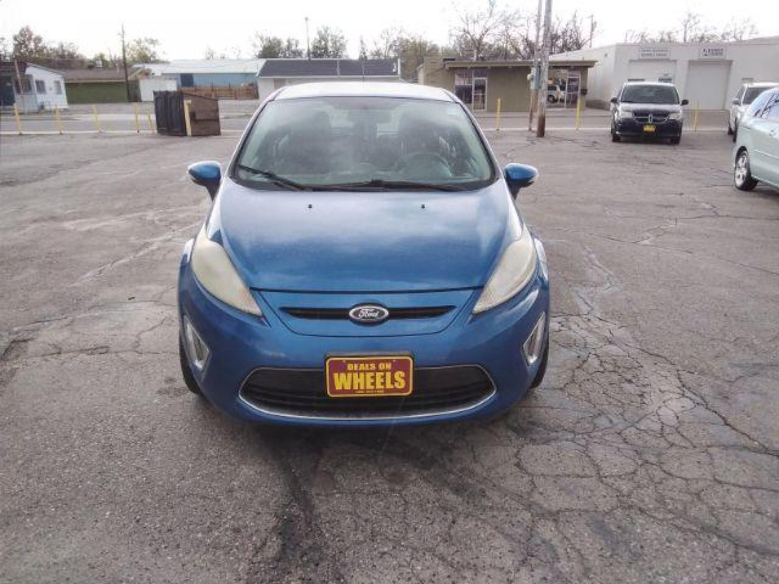2011 Ford Fiesta SES Hatchback (3FADP4FJ6BM) with an 1.6L L4 DOHC 16V engine, located at 4047 Montana Ave, Billings, MT, 59101, (406) 543-1986, 45.770824, -108.529411 - Photo #7