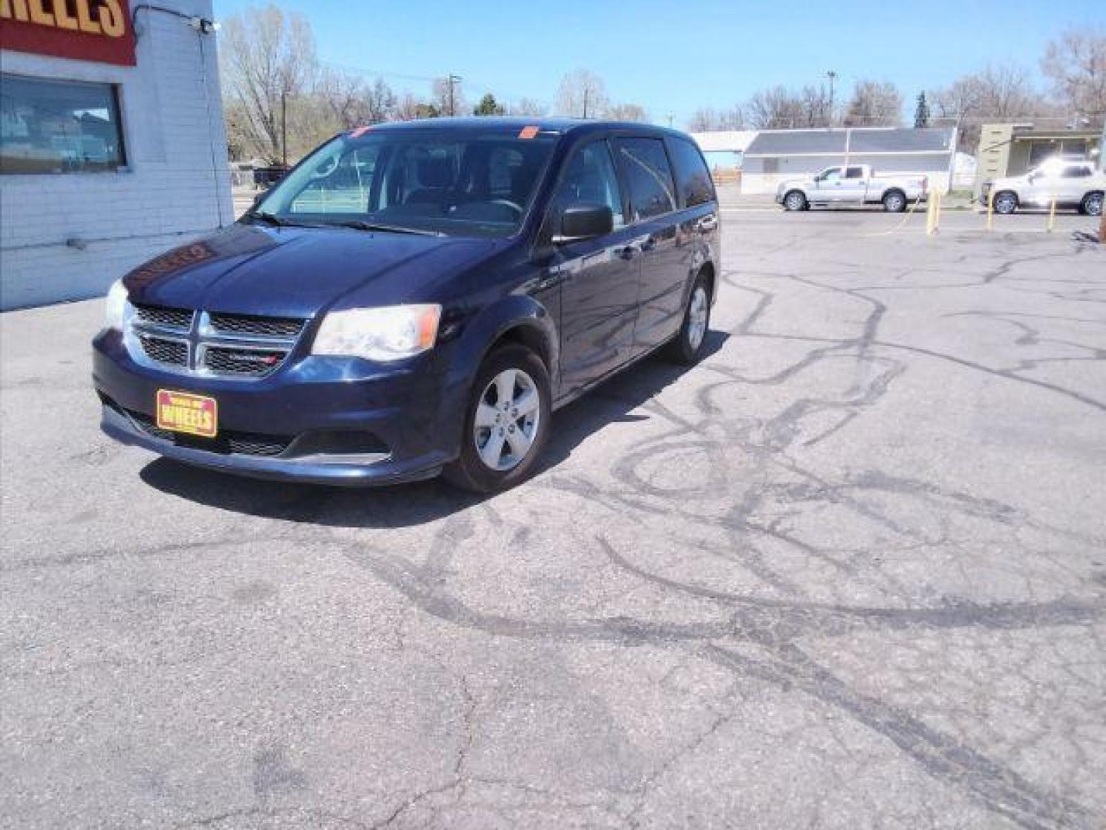 2013 Blue Streak Pearl Dodge Grand Caravan SE (2C4RDGBG5DR) with an 3.6L V6 DOHC 24V engine, 6-Speed Automatic transmission, located at 4047 Montana Ave, Billings, MT, 59101, (406) 543-1986, 45.770824, -108.529411 - Photo #0
