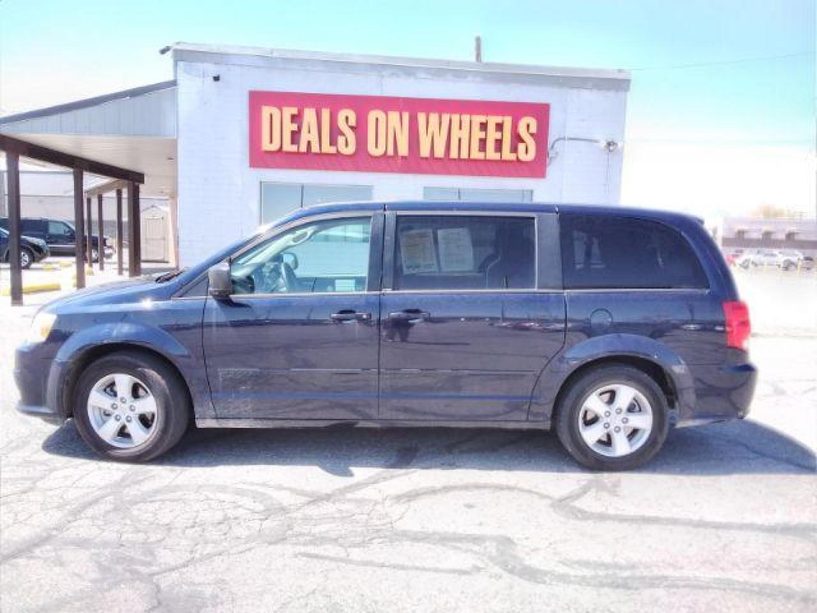 2013 Blue Streak Pearl Dodge Grand Caravan SE (2C4RDGBG5DR) with an 3.6L V6 DOHC 24V engine, 6-Speed Automatic transmission, located at 4047 Montana Ave, Billings, MT, 59101, (406) 543-1986, 45.770824, -108.529411 - Photo #1