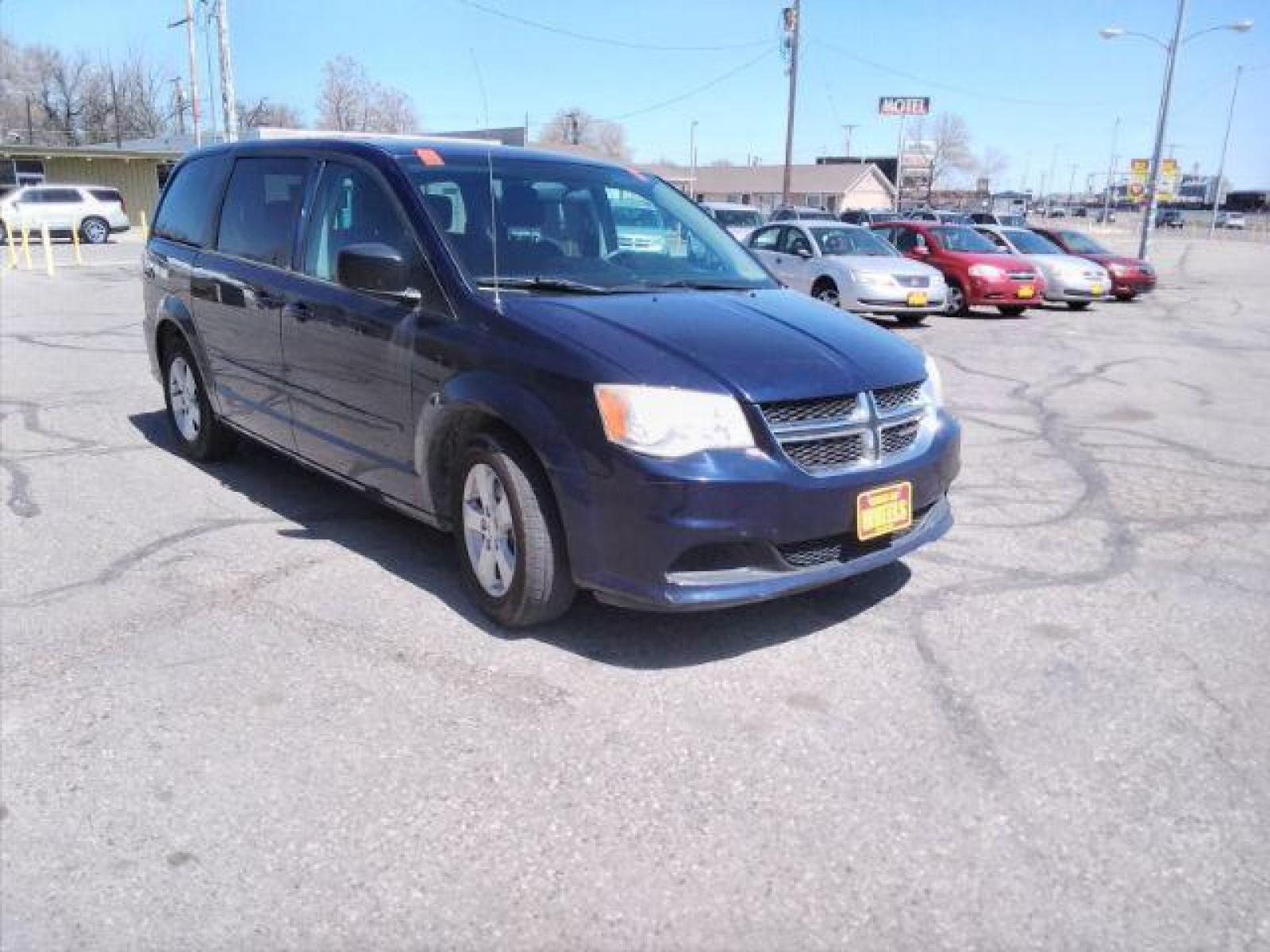 2013 Blue Streak Pearl Dodge Grand Caravan SE (2C4RDGBG5DR) with an 3.6L V6 DOHC 24V engine, 6-Speed Automatic transmission, located at 4047 Montana Ave, Billings, MT, 59101, (406) 543-1986, 45.770824, -108.529411 - Photo #6