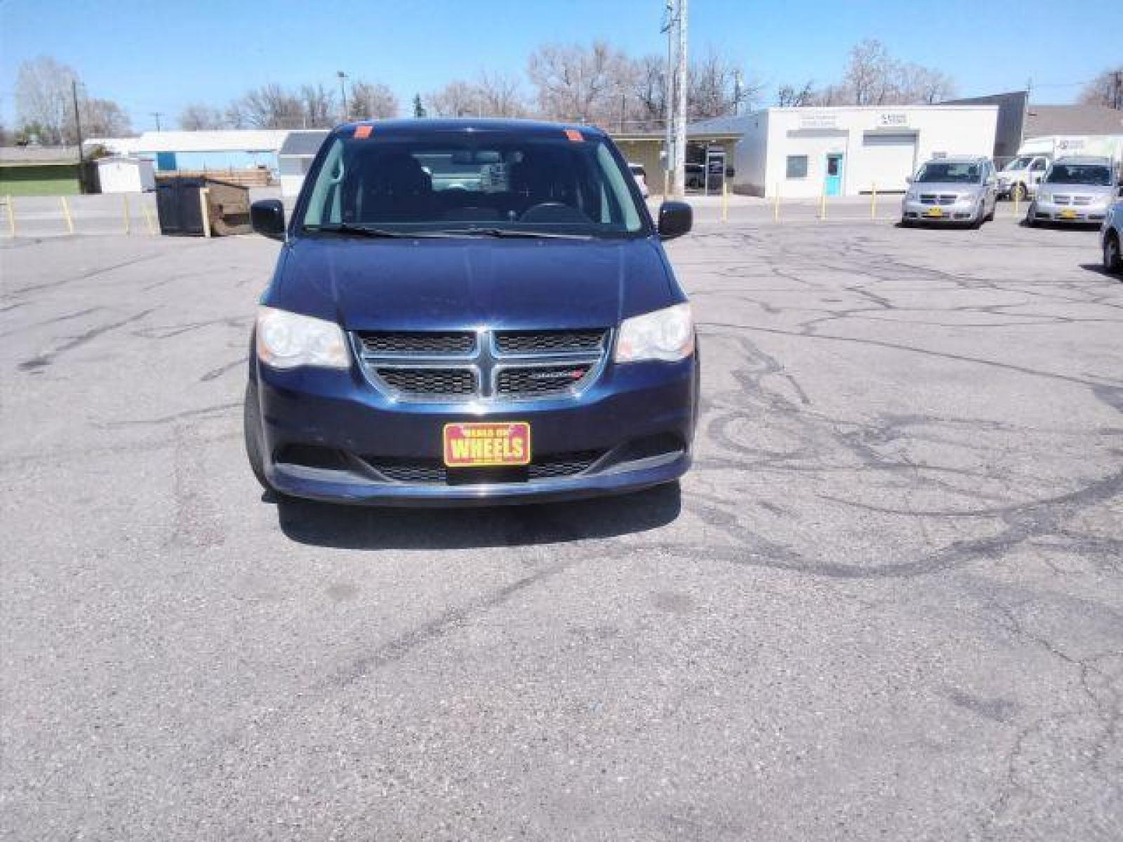 2013 Blue Streak Pearl Dodge Grand Caravan SE (2C4RDGBG5DR) with an 3.6L V6 DOHC 24V engine, 6-Speed Automatic transmission, located at 4047 Montana Ave, Billings, MT, 59101, (406) 543-1986, 45.770824, -108.529411 - Photo #7